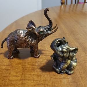 Vintage brass elephant butane lighters. They work, but have no butane in them.
